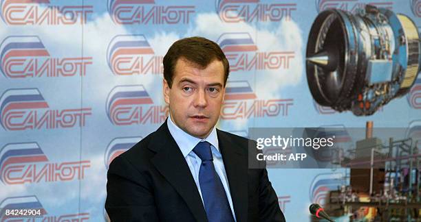 Russian President Dmitry Medvedev speaks as he visits the mechanical treatment shop of the Moscow Machine-Building Plant Salyut on January 11, 2009....