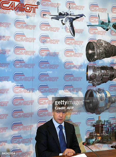 Russian President Dmitry Medvedev speaks as he visits the mechanical treatment shop of the Moscow Machine-Building Plant Salyut on January 11, 2009....