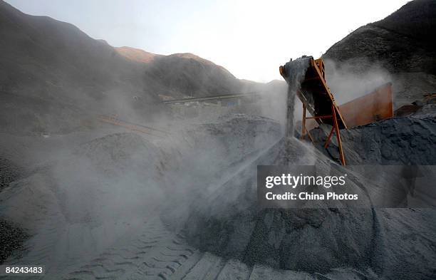 Stone materials are processed at the construction site of second phase of the Qinghai-Tibet railway from Xining to Golmud on January 11, 2009 in...