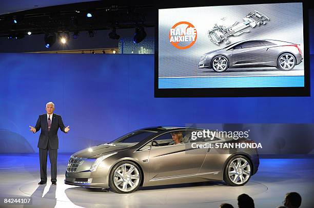 Vice Chairman Bob Lutz unveils the Cadillac Converj electric car during a press preview at the North American International Auto Show January 11,...