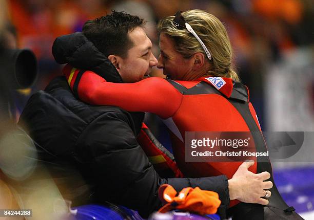 Claudia Pechstein of Germany kisses his husband Marcus after winning the European Championships of the Essent ISU European Speed Skating...