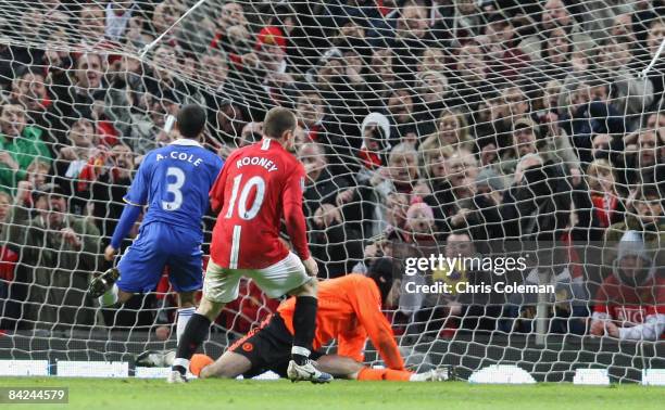 Wayne Rooney of Manchester United scores their second goal during the Barclays Premier League match between Manchester United and Chelsea at Old...