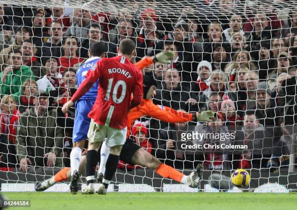 Wayne Rooney of Manchester United scores their second goal during the Barclays Premier League match between Manchester United and Chelsea at Old...