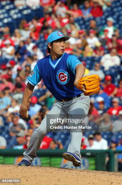 Koji Uehara of the Chicago Cubs throws a pitch in the eighth inning during a game against the Philadelphia Phillies at Citizens Bank Park on August...