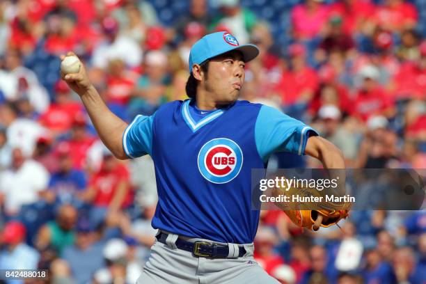 Koji Uehara of the Chicago Cubs throws a pitch in the eighth inning during a game against the Philadelphia Phillies at Citizens Bank Park on August...