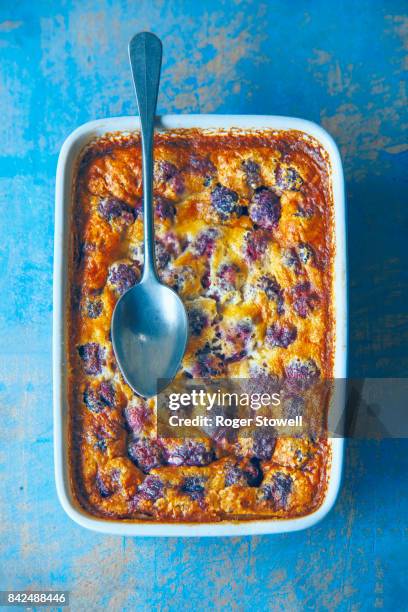 traditional french dessert - clafoutis of dark cherries - dark sweet cherries stock-fotos und bilder