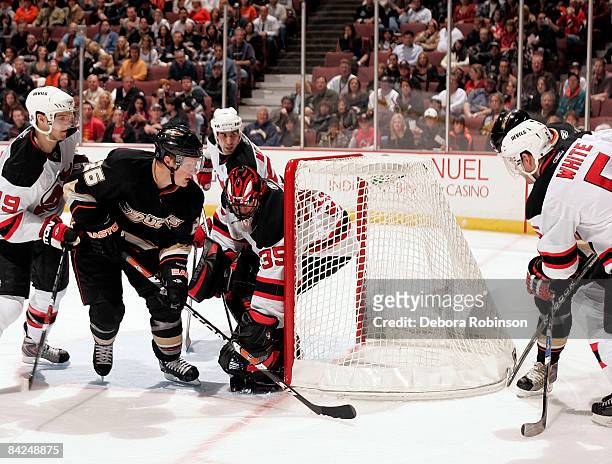 Scott Clemmensen of the New Jersey Devils defends the net against Samuel Pahlsson of the Anaheim Ducks during the game on January 11, 2009 at Honda...