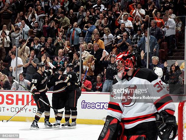 The Anaheim Ducks celebrate a third period goal from teammate Chris Kunitz during the game against the New Jersey Devils on January 11, 2009 at Honda...
