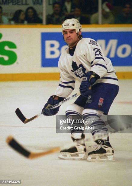 Tie Domi of the Toronto Maple Leafs skates against the Chicago Black Hawks during NHL game action on December 20, 1995 at Maple Leaf Gardens in...