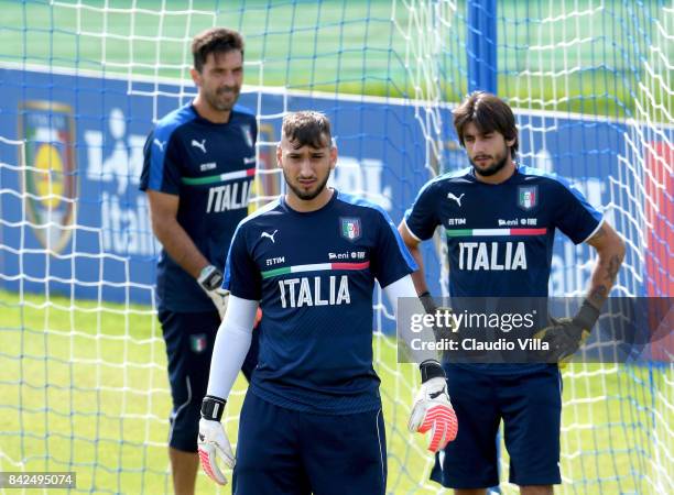 Gianluigi Buffon, Gianluigi Donnarumma and Mattia Perin of Italy look on during the training session at Italy club's training ground at Coverciano on...