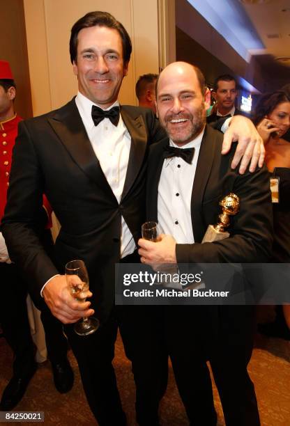 Actor Jon Hamm and "Mad Men" creator Matthew Weiner pose with Moet & Chandon at the 66th Golden Globe Awards held at the Beverly Hilton Hotel on...