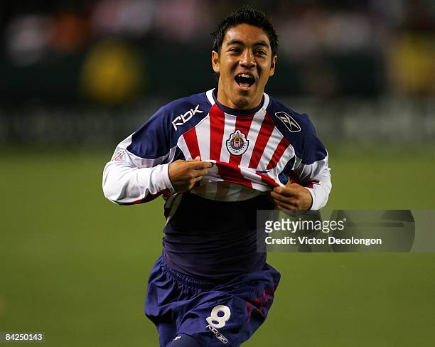 Marco Fabian of CD Chivas de Guadalajara celebrates after tying the game 1-1 in the second half during their InterLiga match against Morelia at The...
