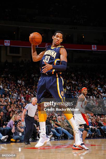 Danny Granger of the Indiana Pacers grabs a vital rebound down the stretch against the Golden State Warriors on January 11, 2009 at Oracle Arena in...