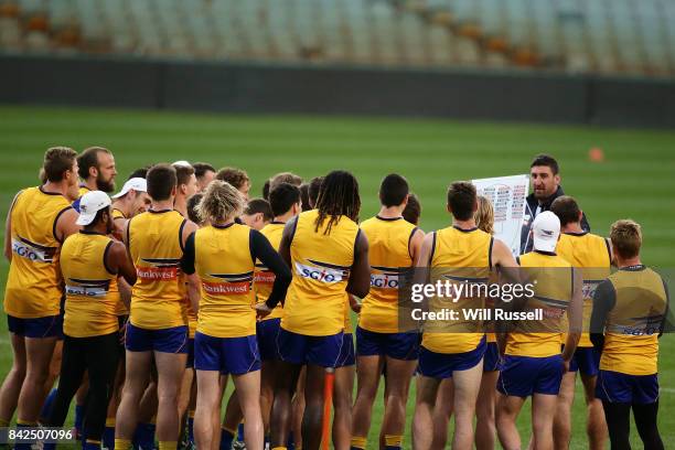 Midfield coach Dean Cox speaks to the team during a West Coast Eagles AFL training session at Domain Stadium on September 4, 2017 in Perth, Australia.