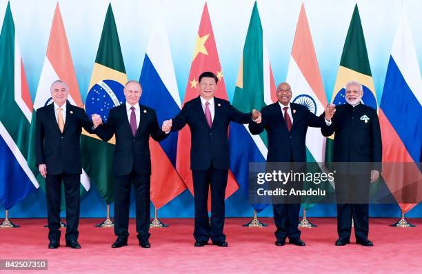 Chinas president Xi Jinping , Russian President Vladimir Putin , South African president Jacob Zuma , President of Brazil Michel Temer , and Prime...