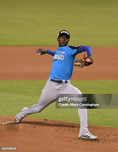 Los Angeles Dodgers prospect Yadier Alvarez of the World Team pitches during the 2017 SiriusXM All-Star Futures Game at Marlins Park on July 9, 2017...