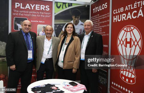 Ossie Ardiles and Mike Summerbee pose on the Club Atletico Huracan stand during day 1 of the Soccerex Global Convention at Manchester Central...