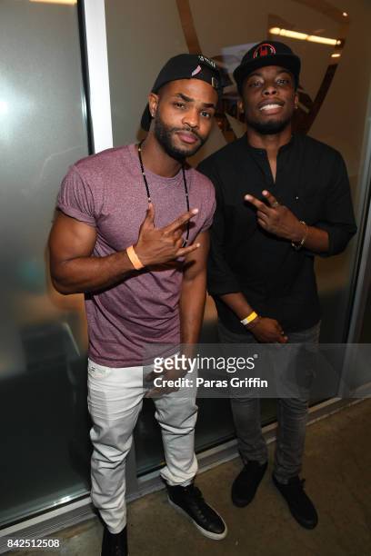 Andrew Bachelor aka 'King Bach' and Woody McClain at LudaDay Weekend Topgolf Takeover at Topgolf Midtown on September 3, 2017 in Atlanta, Georgia.