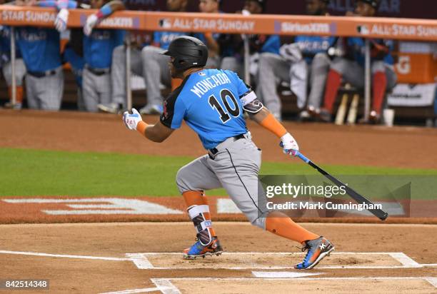 Chicago White Sox prospect Yoan Moncada of the World Team bats during the 2017 SiriusXM All-Star Futures Game at Marlins Park on July 9, 2017 in...