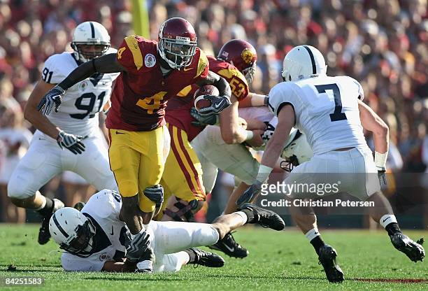Runningback Joe McKnight of the USC Trojans rushes the ball during the 95th Rose Bowl Game presented by Citi against the Penn State Nittany Lions at...