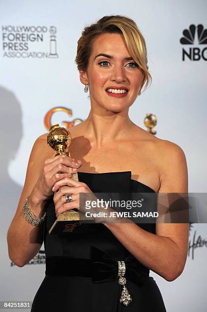 Actress Kate Winslet holds her award for winning Best Performance by an Actress in a Supporting Role in a Motion Picture for "The Reader" at the 66th...