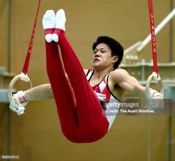 Kazuyuki Takeda competes in the Rings during the Artistic Gymnastics Japan Men's National Team Trial at the National Training Center on September 2,...