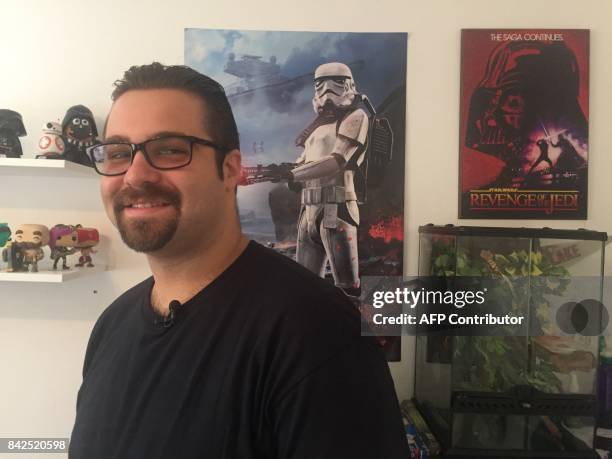 Tomas Pendola talks to AFP in his apartment in Little Havana, a Hispanic neighborhood in Miami, Florida, September 3, 2017. Pendola is one of the...