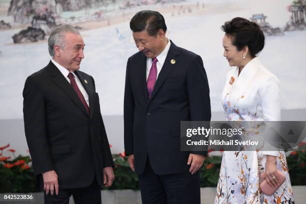 Brazilian President Michel Temer with Chinese President Xi Jinping and his wife Peng Liyuan prior to the dinner on September 4, 2017 in Xiamen,...