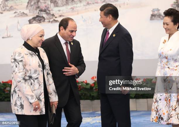 Chinese President Xi Jinping and his wife Peng Liyuan with Egyptian President Abdel Fattah el-Sisi and his wife Entissar Amer prior to the dinner on...