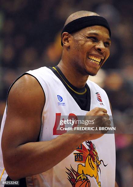Basket-CHN-NBA-CBA-Wells" by Robert SaigetFormer NBA star Bonzi Wells gestures while leading Shanxi to victory over the Beijing Ducks during CBA...