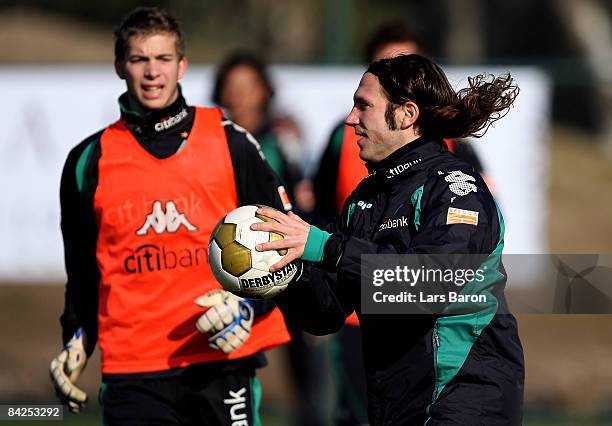 Torsten Frings catches the ball during a training session during day five of Werder Bremen training camp on January 12, 2009 in Belek, Turkey.