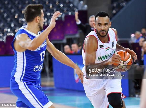 Adam Hanga of Hungary vies with Jakub Sirina of Czech Republic during Group C of the FIBA Eurobasket 2017 mens basketball match between Hungary and...