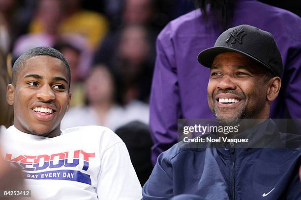 Denzel Washington and Malcolm Washington attend the Los Angeles Lakers vs Miami Heat game at the Staples Center on January 11, 2009 in Los Angeles,...