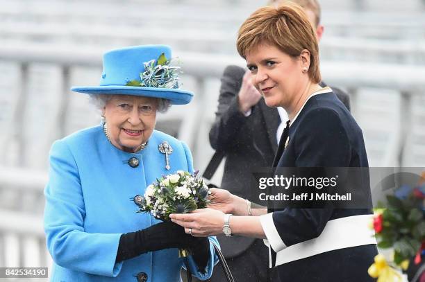 Queen Elizabeth II poses with Scottish First Minister Nicola Sturgeon on the Queensferry Crossing during the official opening ceremony, on September...