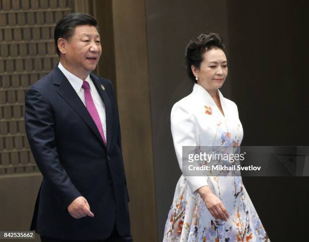 Chinese President Xi Jinping and his wife Peng Liyuan arrive to the dinner on September 4, 2017 in Xiamen, China. Leaders of Russia, China, India,...