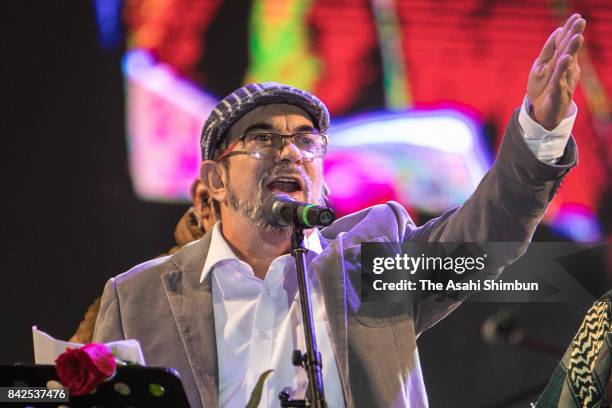 Rodrigo Londono, or commonly known as Timoleon Jimenez, leader of disarmed guerrilla group Revolutionary Armed Forces of Colombia celebrates its...