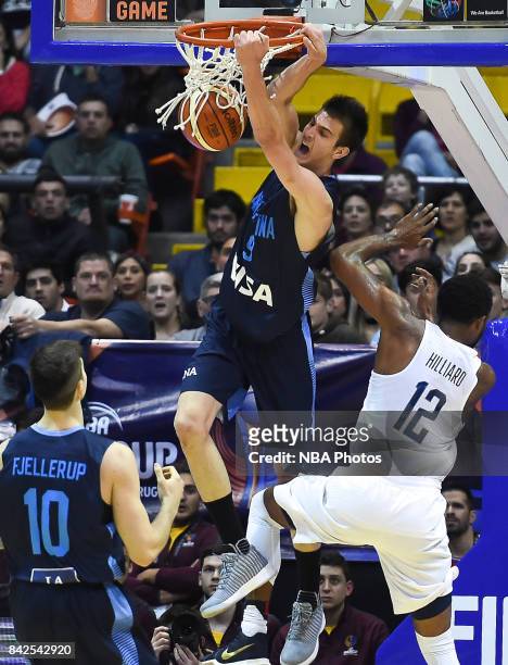 Nicolas Brussino of Argentina dunks the ball against Darrun Hilliard II of United States during the FIBA Americup final match between US and...