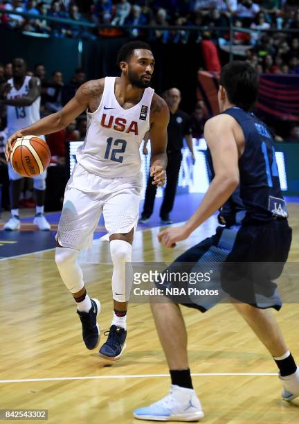 Darrun Hilliard II of United States fights for ball with Gabriel Deck of Argentina during the FIBA Americup final match between US and Argentina at...