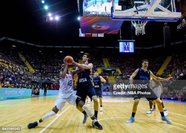 Darrun Hilliard II of United States fights for ball with Nicolas Brussino of Argentina during the FIBA Americup final match between US and Argentina...