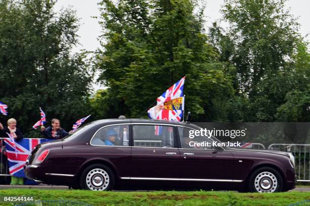 The Queen is greeted by wellwishers as she arrives for an official ceremony after cutting a ribbon officially opening the Queensferry Crossing and...