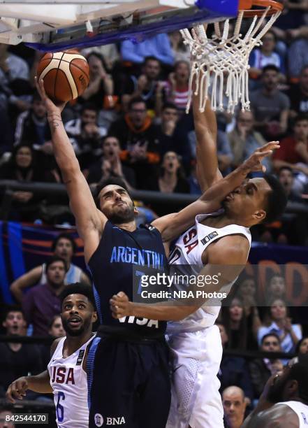 Facundo Campazzo of Argentina fights for ball with Reggie Hearn of United States during the FIBA Americup final match between US and Argentina at...