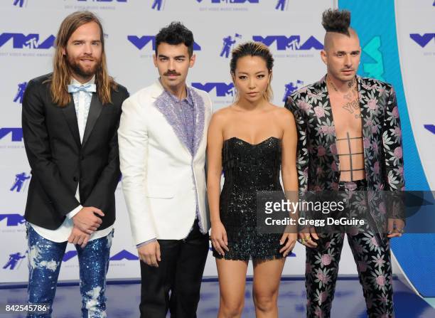 Joe Jonas, Jack Lawless, Cole Whittle and JinJoo Lee of DNCE arrive at the 2017 MTV Video Music Awards at The Forum on August 27, 2017 in Inglewood,...