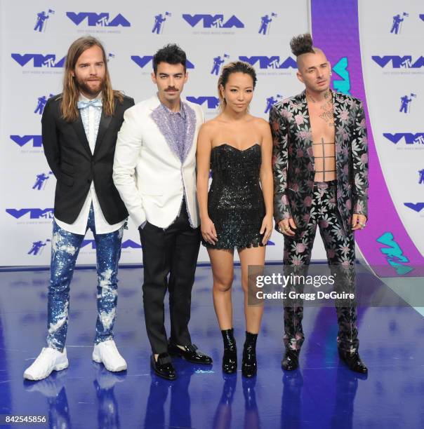 Joe Jonas, Jack Lawless, Cole Whittle and JinJoo Lee of DNCE arrive at the 2017 MTV Video Music Awards at The Forum on August 27, 2017 in Inglewood,...