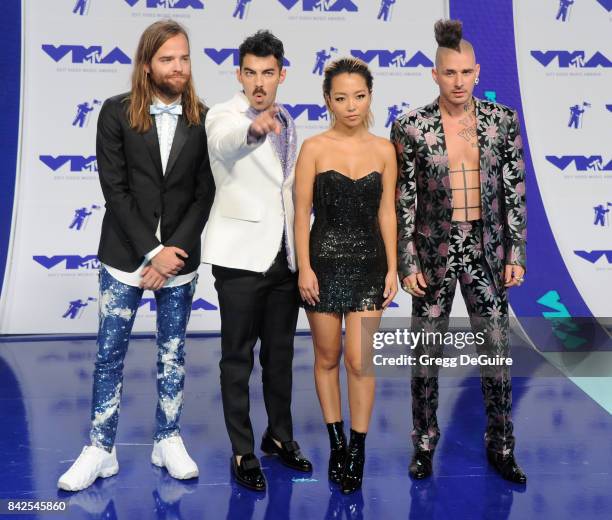 Joe Jonas, Jack Lawless, Cole Whittle and JinJoo Lee of DNCE arrive at the 2017 MTV Video Music Awards at The Forum on August 27, 2017 in Inglewood,...