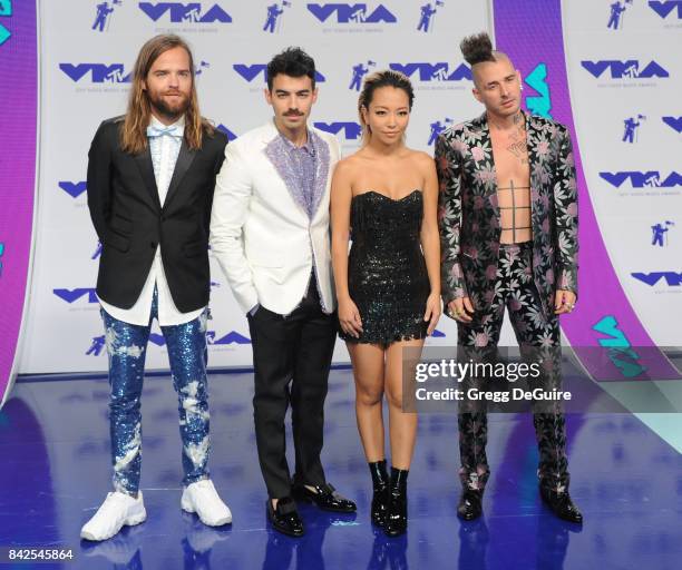 Joe Jonas, Jack Lawless, Cole Whittle and JinJoo Lee of DNCE arrive at the 2017 MTV Video Music Awards at The Forum on August 27, 2017 in Inglewood,...