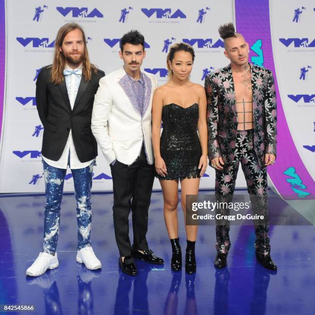 Joe Jonas, Jack Lawless, Cole Whittle and JinJoo Lee of DNCE arrive at the 2017 MTV Video Music Awards at The Forum on August 27, 2017 in Inglewood,...