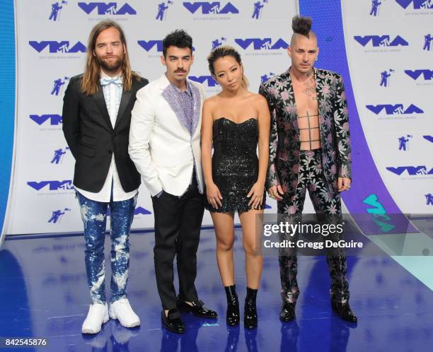 Joe Jonas, Jack Lawless, Cole Whittle and JinJoo Lee of DNCE arrive at the 2017 MTV Video Music Awards at The Forum on August 27, 2017 in Inglewood,...