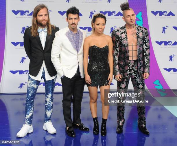 Joe Jonas, Jack Lawless, Cole Whittle and JinJoo Lee of DNCE arrive at the 2017 MTV Video Music Awards at The Forum on August 27, 2017 in Inglewood,...