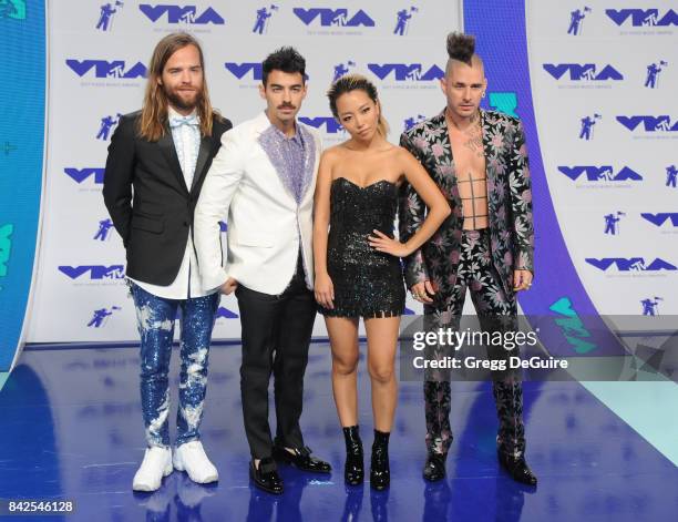 Joe Jonas, Jack Lawless, Cole Whittle and JinJoo Lee of DNCE arrive at the 2017 MTV Video Music Awards at The Forum on August 27, 2017 in Inglewood,...