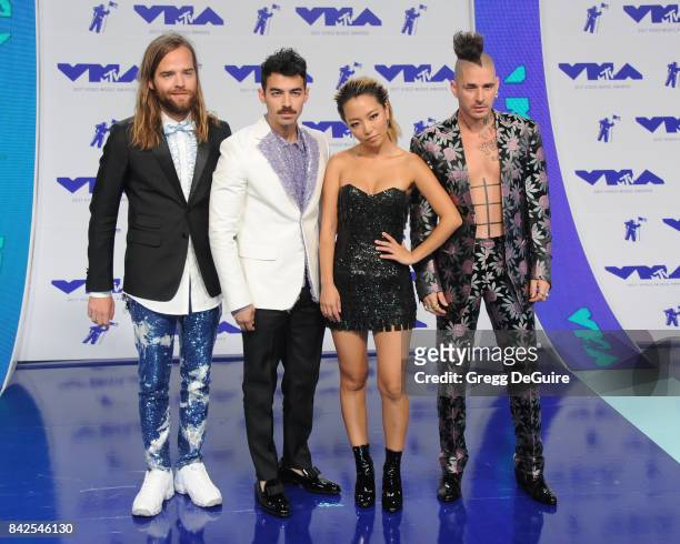 Joe Jonas, Jack Lawless, Cole Whittle and JinJoo Lee of DNCE arrive at the 2017 MTV Video Music Awards at The Forum on August 27, 2017 in Inglewood,...